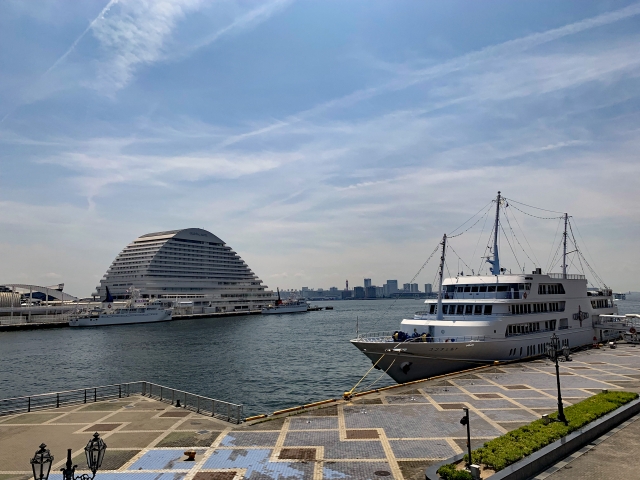 An aerial view of Kobe city with Kobe Port Tower visible by the waterfront